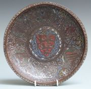 A 13thC French copper and polychrome champlevé enamel gemellion of typical shallow dished form,