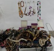 A collection of costume jewellery including glass pendants, necklaces etc
