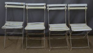 Set of four white painted wood and metal folding garden chairs