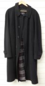 Vintage Burberrys gents navy blue wool and camel hair overcoat with tartan lining, approximately 48