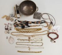 A collection of costume jewellery including Sarah Coventry brooch, beads, silver and mother of pearl