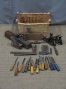 A collection of wooden woodworking tools to include set squares, spokeshave, chisels and a spirit
