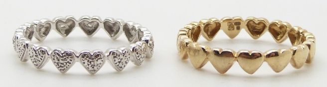 A 9ct white gold eternity ring made up of heart sections set with diamonds and a matching 9ct gold
