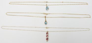 Three 9ct gold necklaces, two set with topaz and diamonds the other with synthetic rubies and