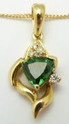 An 18ct gold necklace set with a tourmaline and diamonds, 4.8g