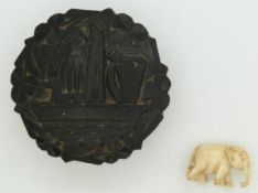 A carved Irish jet box depicting harps, shamrocks from Killarney and an ivory elephant