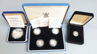 A cased set of four Royal Mint UK silver proof £1 coins 1989-1992, together with an Isle of Man