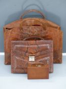 Three ladies handbags comprising alligator skin large bag, snakeskin briefcase and miniature