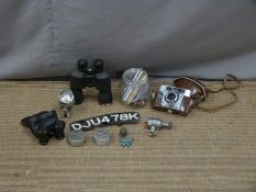 Vintage motorbike number plate, Miller headlight and dynamo, Liberman binoculars, Agfa camera,