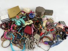 A collection of costume jewellery including Exquisite brooch, silver pendant, silver bracelets,