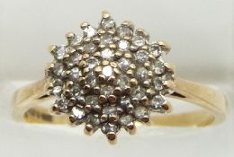 A 9ct gold ring set with a cluster of diamonds, 2.7g, size O