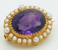 Edwardian brooch set with an oval cut amethyst surrounded by pearls, 2 x 1.8cm
