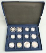 Westminster Collection box containing twelve silver UK coins including £1, fifty pence, £2, crown