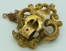 Victorian yellow metal buckle brooch, 3.5 x 3.2cm