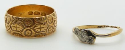 Victorian 18ct gold ring with embossed decoration, Birmingham 1891 and an 18ct gold ring set with