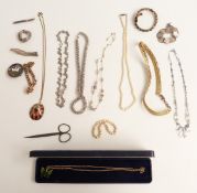 A collection of jewellery including enamelled crown, pearl necklace, silver necklace, silver