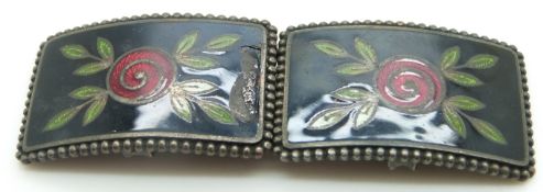 French enamel buckle with stylized floral and foliate decoration within a beaded border, width 8cm