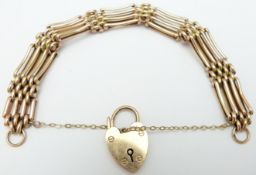 A 9ct rose gold gate bracelet with padlock clasp, 18.8g