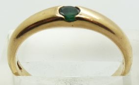 A 9ct gold ring set with an emerald, 2.9g, size R
