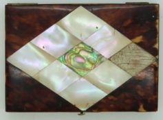 A mother of pearl and tortoiseshell card case, the front set with an etched white metal plaque.
