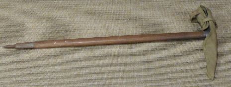 Vintage ash handled ice climbing axe marked Claudius Simond Chamonix Mont Blanc with alpaca head