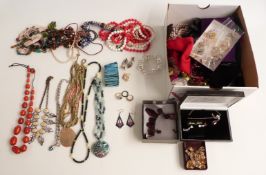 A collection of costume jewellery including Art Deco earrings, beads, silver ring, abalone pendant