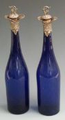 Pair of Victorian Bristol blue glass decanters with hallmarked silver mounts and stopper,