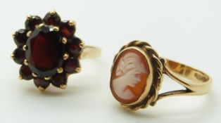 A 9ct gold cameo ring and a 9ct gold ring set with garnets, 7.4g