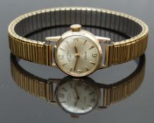 Rotary 9ct gold ladies wristwatch with gold hands and hour markers, silver dial and 21 jewel calibre