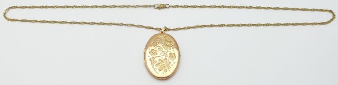 A 9ct gold locket and chain, 9.8g