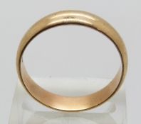 A large 9ct gold ring/ wedding band, size 1, 5.6g.
