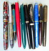 Ten fountain pens and propelling pencils.
