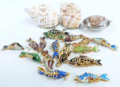A quantity of enamel fish pendants, quartz pendant and two shell containers