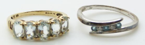 A 9ct white gold ring set with diamonds and aquamarines and a 9ct gold ring set with five opal cut