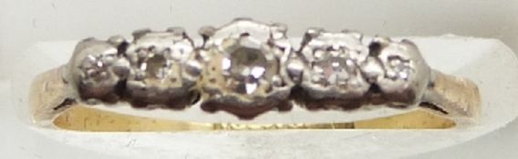 An 18ct gold ring set with five diamonds in a platinum setting, 1.7g, size J