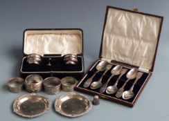 Cased pair of hallmarked silver salts, cased set of six hallmarked silver teaspoons, pair of feature