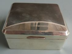Hallmarked silver cigarette box with chamfered corners, Birmingham 1957 maker Adie Brothers Ltd,
