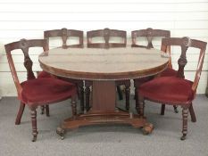 Victorian mahogany breakfast table and five chairs with carved decoration and turned front legs