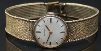 COLLECTING Marvin 9ct gold ladies wristwatch with gold hands, two-tone hour markers, silver dial and