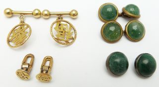 A pair of 18ct gold Chinese cufflinks with character decoration with two matching studs, 8.2g, and a