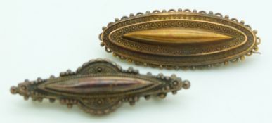 Two 15ct gold Victorian/Edwardian brooches,  one with glass compartment verso, 5.4g