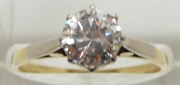 An 18ct gold ring set with a round brilliant cut diamond measuring approximately 1.2ct, 3.1g, size
