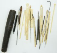 19thC sewing set in tubular case, comprising needles, hooks etc, length of case 20cm