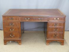 Twin pedestal desk having leather or similar inset top, fitted eight variously sized drawers, W152 x