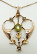 Edwardian 9ct gold pendant set with a peridot and seed pearls, 3.2g