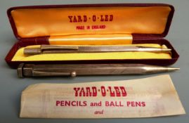 Two silver Yard O Led propelling pencils, one in original box with instructions.