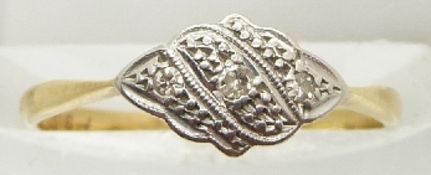 An 18ct gold ring set with diamonds in a platinum setting, 1.4g, size J