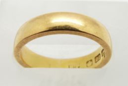 A 22ct gold ring/ wedding band, Birmingham 1919, size J, 5.3g.