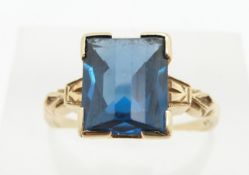 A 14k ring set with a mixed cut blue paste stone, 2.4g, size K