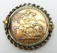 An 1887 gold full sovereign in a brooch mount